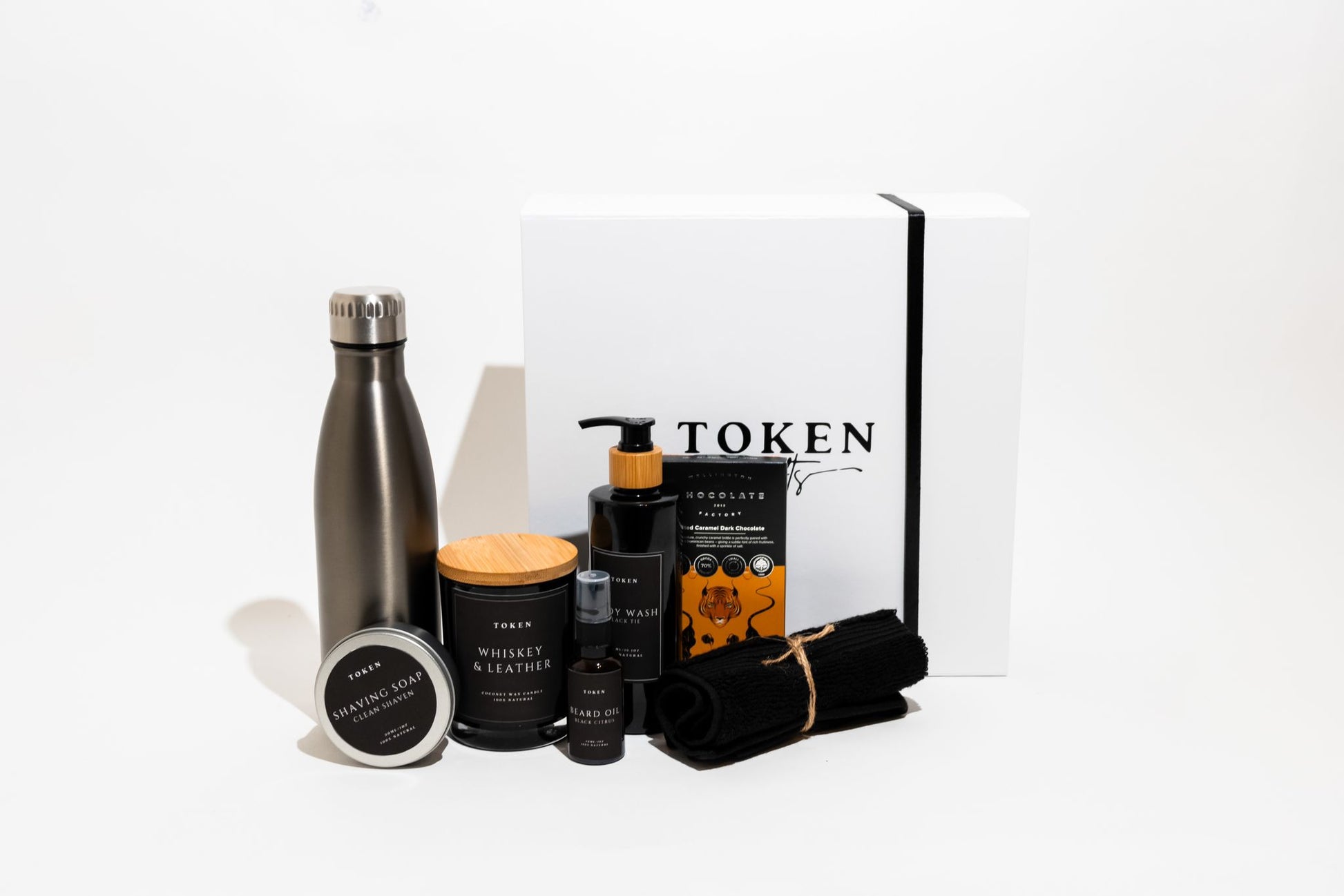 Mens Gift Box. Includes: Drink Bottle, Shaving Soap, Body Wash, Candle, Beard Oil, Face Cloth, Chocolate